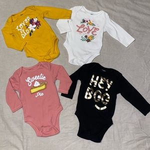 6-12 Months OLD NAVY Onesies. Some are new.